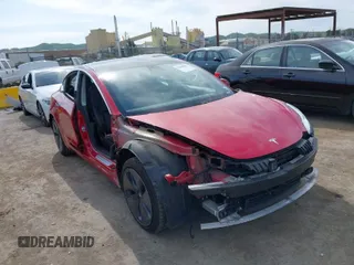 2020 Tesla Model 3 Long Range with VIN 5YJ3E1EB6LF649824, listed as a IAAI auction lot 41766020 with 71,230 mi miles. Bid and sale history available at carsss.com. Image 1.