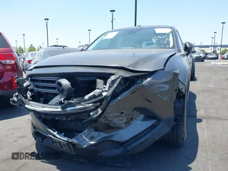 2017 Mazda CX-9 Touring with VIN JM3TCBCY1H0131233, listed as a IAAI auction lot 42490137 with 84,216 mi miles and . Bid and sale history available at DreamBid. Image 6.