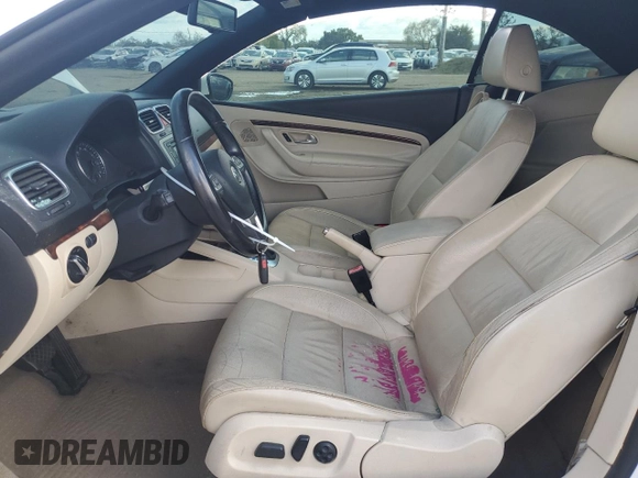 2012 Volkswagen Eos Lux with VIN WVWFW7AH8CV018727, listed as a Copart auction lot 51332135 with 104,636 mi miles and Salvage Title. Bid and sale history available at DreamBid. Image 7.