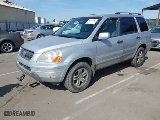 2003 Honda Pilot EX with VIN 2HKYF18443H571688, listed as a IAAI auction lot 42097297 with 313,910 mi miles. Bid and sale history available at carsss.com. Image 2.