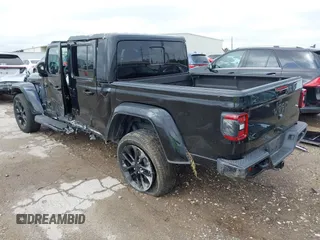 2023 Jeep Gladiator Overland with VIN 1C6HJTFG6PL555153, listed as a IAAI auction lot 42210878 with 40,576 mi miles and . Bid and sale history available at DreamBid. Image 3.