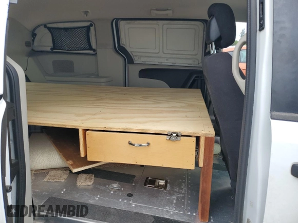 2014 Ram Cargo Van Tradesman с VIN 2C4JRGAG7ER113682, выставлен на аукционе Copart как лот 56800015 с пробегом 74 320 миль миль и Списание • Salvage title. История ставок и продаж доступна на DreamBid. Изображение 11.