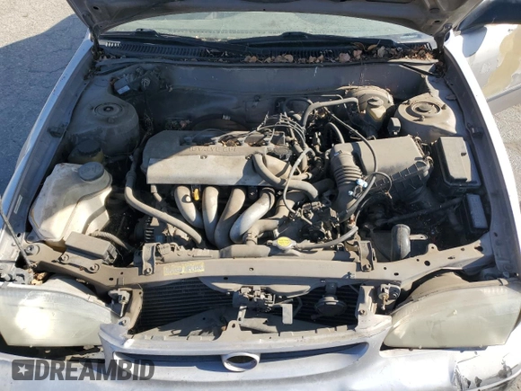 1998 Toyota Corolla VE with VIN 1NXBR12E3WZ093073, listed as a Copart auction lot 58270705 with 303,875 mi miles and Salvage title. Bid and sale history available at DreamBid. Image 11.