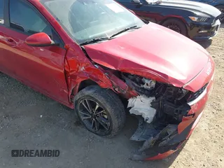 2022 Kia Forte LXS with VIN 3KPF24AD0NE462828, listed as a IAAI auction lot 42019108 with 25,536 mi miles and . Bid and sale history available at DreamBid. Image 6.