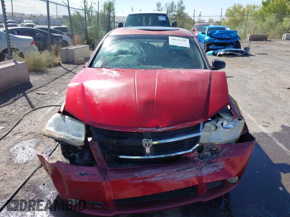 2008 Dodge Avenger SXT with VIN 1B3LC56R98N169618, listed as a IAAI auction lot 40626545 with 153,921 mi miles. Bid and sale history available at carsss.com. Image 12.