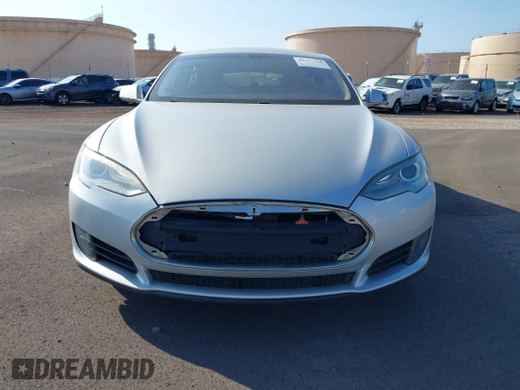 2013 Tesla Model S with VIN 5YJSA1AC3DFP10537, listed as a IAAI auction lot 40707549 with 103,111 mi miles and . Bid and sale history available at DreamBid. Image 13.