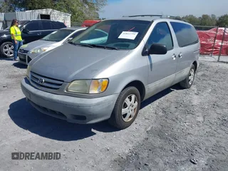 2002 Toyota Sienna CE with VIN 4T3ZF19C92U435896, listed as a IAAI auction lot 41822799 with 201,238 mi miles. Bid and sale history available at carsss.com. Image 2.