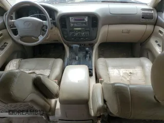 1999 Toyota Land Cruiser z VIN JT3HT05J5X0050404, wystawiony jako Copart lot #56066125 z przebiegiem 385 659 mil mil oraz Tytuł czysty. Historia ofert i sprzedaży dostępna na DreamBid. Obrazek 8.