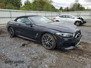 2019 BMW 8 Series M850i xDrive with VIN WBAFY4C58KBX39395, listed as a Copart auction lot 74088834 with 27,413 mi miles and Salvage title. Bid and sale history available at DreamBid. Image 4.