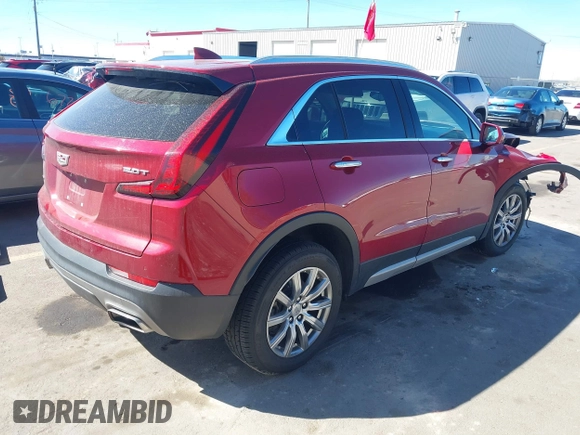2019 Cadillac XT4 AWD Premium Luxury с VIN 1GYFZDR44KF133013, выставлен на аукционе IAAI как лот 41868561 с пробегом 96 956 миль миль и . История ставок и продаж доступна на DreamBid. Изображение 4.