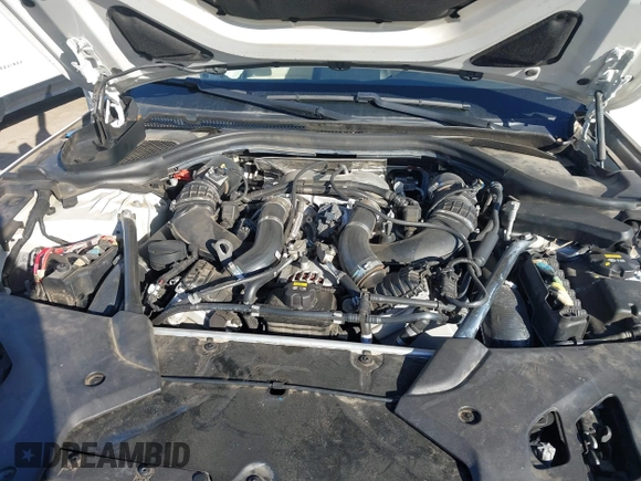 2018 BMW 5 Series M550i xDrive with VIN WBAJB9C54JB050218, listed as a IAAI auction lot 41132695 with 69,659 mi miles. Bid and sale history available at carsss.com. Image 10.