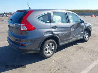 2015 Honda CR-V LX with VIN 3CZRM3H31FG709059, listed as a IAAI auction lot 42131551 with 98,738 mi miles and . Bid and sale history available at carsss.com. Image 4.