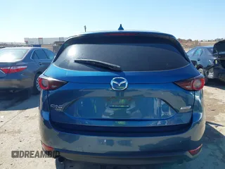 2018 Mazda CX-5 Touring with VIN JM3KFBCM0J0302916, listed as a IAAI auction lot 41837733 with 100,765 mi miles. Bid and sale history available at carsss.com. Image 17.