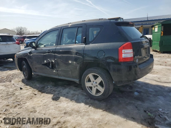 2010 Jeep Compass Sport with VIN 1J4NF4FB2AD591523, listed as a Copart auction lot 48809775 with 105,720 mi miles and Salvage Title. Bid and sale history available at carsss.com. Image 2.