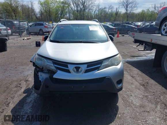 2014 Toyota RAV4 LE with VIN JTMBFREV7ED050667, listed as a IAAI auction lot 42082759 with 270,927 mi miles and . Bid and sale history available at DreamBid. Image 12.