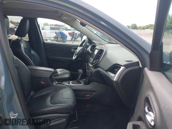 2014 Jeep Cherokee Trailhawk z VIN 1C4PJMBS4EW236950, wystawiony jako IAAI lot #42636128 z przebiegiem 170 491 mil mil oraz . Historia ofert i sprzedaży dostępna na DreamBid. Obrazek 5.