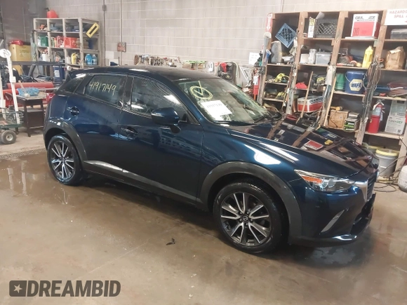 2017 Mazda CX-3 Touring with VIN JM1DKFC72H0145267, listed as a IAAI auction lot 41917149 with 55,784 mi miles. Bid and sale history available at carsss.com. Image 1.