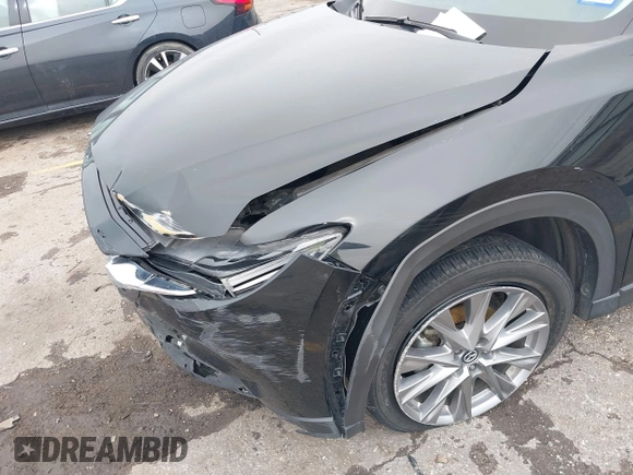 2020 Mazda CX-5 Grand Touring with VIN JM3KFADM8L0811910, listed as a IAAI auction lot 41446214 with 57,849 mi miles. Bid and sale history available at carsss.com. Image 6.
