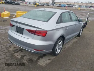 2018 Audi A3 Sedan Premium with VIN WAUAUGFFXJ1040608, listed as a IAAI auction lot 41708256 with 55,359 mi miles. Bid and sale history available at carsss.com. Image 4.