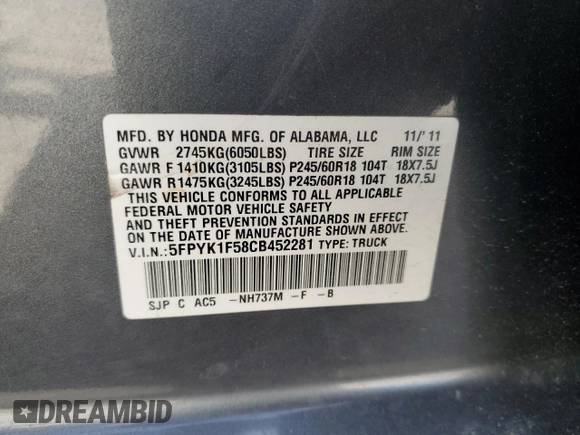 2012 Honda Ridgeline RTL with VIN 5FPYK1F58CB452281, listed as a Copart auction lot 54279455 with 189,314 mi miles and Salvage title. Bid and sale history available at DreamBid. Image 12.