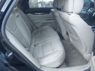 2013 Cadillac XTS Premium z VIN 2G61S5S38D9199459, wystawiony jako IAAI lot #41787638 z przebiegiem 171 298 mil mil oraz . Historia ofert i sprzedaży dostępna na DreamBid. Obrazek 8.