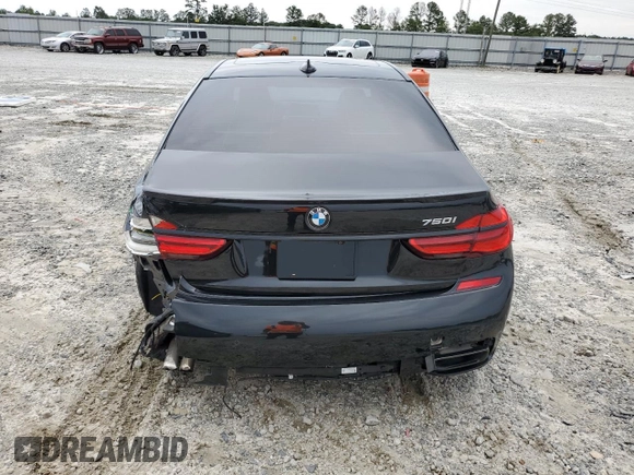 2019 BMW 7 Series 750i with VIN WBA7F0C57KGM25906, listed as a Copart auction lot 62728443 with 61,561 mi miles. Bid and sale history available at carsss.com. Image 6.
