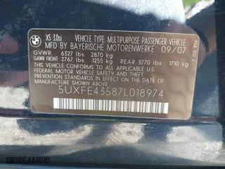 2007 BMW X5 3.0si with VIN 5UXFE43587L018974, listed as a IAAI auction lot 41842712 with 1 mi miles. Bid and sale history available at carsss.com. Image 9.