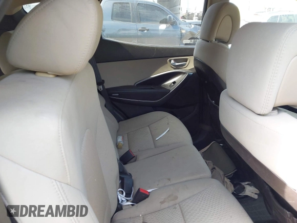 2014 Hyundai Santa Fe with VIN 5XYZTDLB2EG143925, listed as a IAAI auction lot 42243761 with 126,058 mi miles and . Bid and sale history available at DreamBid. Image 8.