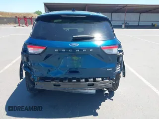 2020 Ford Escape SE Sport Hybrid with VIN 1FMCU0BZ1LUC15585, listed as a IAAI auction lot 42205354 with 21,044 mi miles and . Bid and sale history available at carsss.com. Image 17.