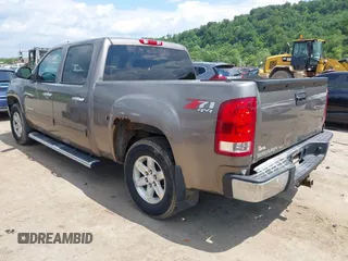 2012 GMC Sierra 1500 SLT with VIN 3GTP2WE71CG189114, listed as a IAAI auction lot 42661045 with 194,328 mi miles and . Bid and sale history available at DreamBid. Image 3.