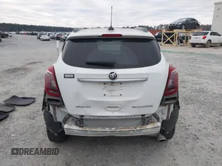2017 Buick Encore Essence with VIN KL4CJCSB7HB011839, listed as a IAAI auction lot 41303660 with 80,789 mi miles and . Bid and sale history available at carsss.com. Image 17.
