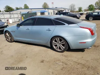 2013 Jaguar XJ Portfolio with VIN SAJWJ2GD3D8V47879, listed as a Copart auction lot 54558195 with 99,500 mi miles and Clean Title. Bid and sale history available at DreamBid. Image 2.