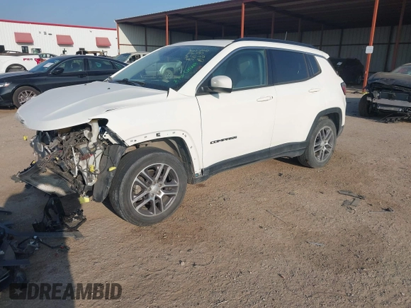 2020 Jeep Compass Latitude with VIN 3C4NJCBB1LT154890, listed as a IAAI auction lot 41787648 with Not Provided miles and . Bid and sale history available at carsss.com. Image 2.