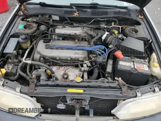 2000 Infiniti G20 Luxury z VIN JNKCP11A1YT304887, wystawiony jako Copart lot #74562724 z przebiegiem 202 140 mil mil oraz Czysty tytuł • Clean title. Historia ofert i sprzedaży dostępna na DreamBid. Obrazek 11.