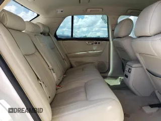 2009 Cadillac DTS 1SC z VIN 1G6KD57Y69U127768, wystawiony jako Copart lot #72415494 z przebiegiem 97 811 mil mil oraz Szkoda całkowita • Salvage title. Historia ofert i sprzedaży dostępna na DreamBid. Obrazek 10.