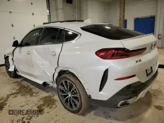 2020 BMW X6 xDrive40i z VIN 5UXCY6C07L9B43453, wystawiony jako Copart lot #52096845 z przebiegiem Nie podano mil oraz Szkoda całkowita • Salvage title. Historia ofert i sprzedaży dostępna na DreamBid. Obrazek 2.