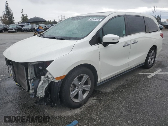 2018 Honda Odyssey EX-L with VIN 5FNRL6H77JB008571, listed as a Copart auction lot 46948585 with 88,699 mi miles and Salvage Title. Bid and sale history available at carsss.com. Image 1.