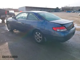 2000 Toyota Camry Solara SE with VIN 2T1CF22P6YC266660, listed as a IAAI auction lot 41762415 with 244,633 mi miles. Bid and sale history available at carsss.com. Image 3.