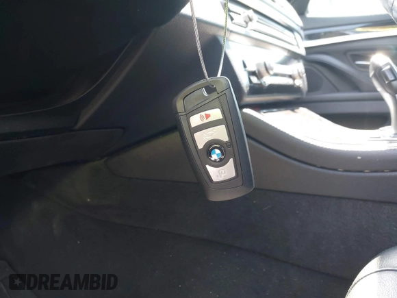 2015 BMW 5 Series 535i xDrive with VIN WBA5B3C59FD545279, listed as a IAAI auction lot 41810032 with 122,936 mi miles. Bid and sale history available at carsss.com. Image 11.