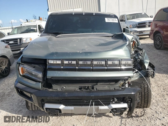 2024 GMC Hummer EV 3X z VIN 1GKB0RDC6RU103340, wystawiony jako Copart lot #79773874 z przebiegiem Nie podano mil oraz Szkody całkowita. Historia ofert i sprzedaży dostępna na DreamBid. Obrazek 5.