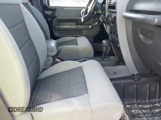 2009 Jeep Wrangler X with VIN 1J4FA24179L711352, listed as a IAAI auction lot 42577898 with 133,309 mi miles and . Bid and sale history available at DreamBid. Image 5.