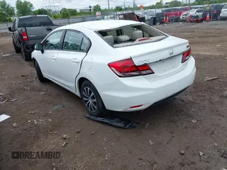 2013 Honda Civic LX z VIN 2HGFB2F52DH545087, wystawiony jako IAAI lot #42256403 z przebiegiem 71 110 mil mil oraz . Historia ofert i sprzedaży dostępna na DreamBid. Obrazek 3.