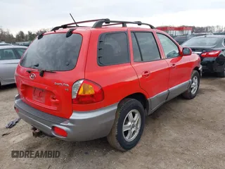 2004 Hyundai Santa Fe GLS with VIN KM8SC13D24U724643, listed as a IAAI auction lot 41908475 with 82,656 mi miles. Bid and sale history available at carsss.com. Image 4.