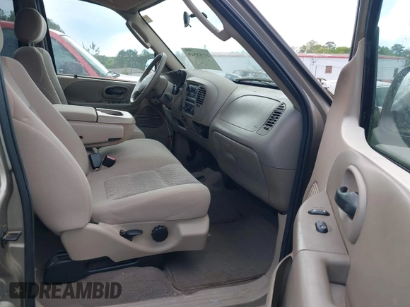 2003 Ford F-150 XLT with VIN 1FTRW08L63KD06455, listed as a IAAI auction lot 41988549 with 138,168 mi miles. Bid and sale history available at carsss.com. Image 5.