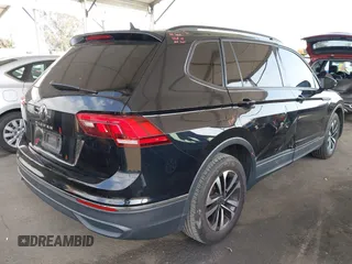 2023 Volkswagen Tiguan S with VIN 3VVRB7AX8PM068965, listed as a IAAI auction lot 42117545 with 60,121 mi miles and . Bid and sale history available at DreamBid. Image 4.