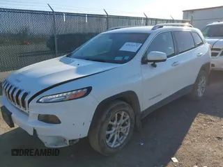 2016 Jeep Cherokee Latitude with VIN 1C4PJMCB1GW204412, listed as a IAAI auction lot 42031132 with 228,442 mi miles and . Bid and sale history available at carsss.com. Image 17.