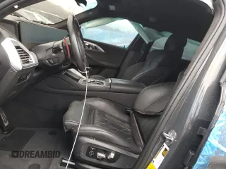 2023 BMW XM z VIN 5YM23CS03P9S57455, wystawiony jako Copart lot #87658815 z przebiegiem Nie podano mil oraz Szkoda całkowita • Salvage title. Historia ofert i sprzedaży dostępna na DreamBid. Obrazek 7.