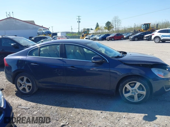 2013 Volvo S60 T5 Premier z VIN YV1612FS5D1202290, wystawiony jako IAAI lot #42042523 z przebiegiem 165 700 mil mil oraz . Historia ofert i sprzedaży dostępna na DreamBid. Obrazek 13.