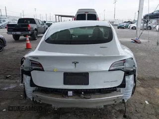 2020 Tesla Model 3 Long Range with VIN 5YJ3E1EB5LF801530, listed as a IAAI auction lot 41682050 with 65,743 mi miles. Bid and sale history available at carsss.com. Image 16.