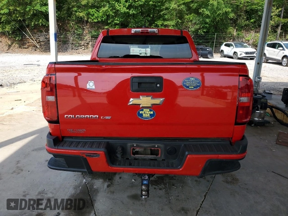 2019 Chevrolet Colorado 2WD Work Truck z VIN 1GCGSBEN1K1352591, wystawiony jako Copart lot #55156865 z przebiegiem 77 742 mil mil oraz Szkoda całkowita • Salvage title. Historia ofert i sprzedaży dostępna na DreamBid. Obrazek 6.